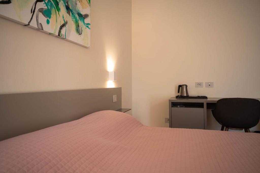 Postel nebo postele na pokoji v ubytování Maison Calcirelli rooms