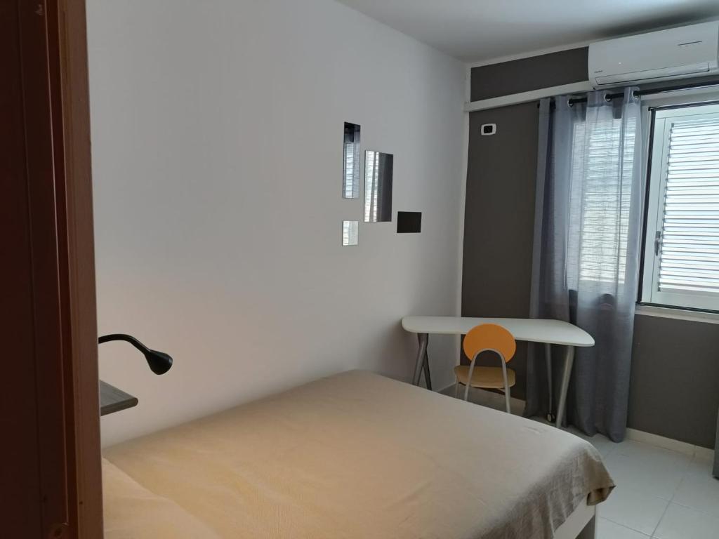Postel nebo postele na pokoji v ubytování B&B Donna Nina