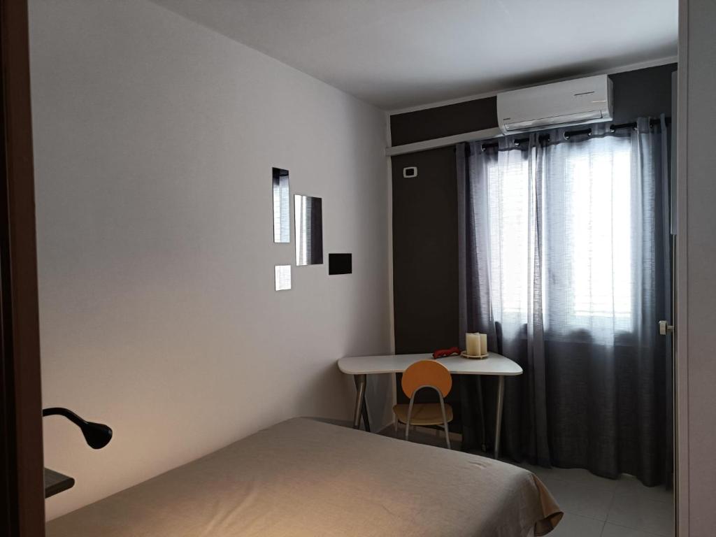 Postel nebo postele na pokoji v ubytování B&B Donna Nina