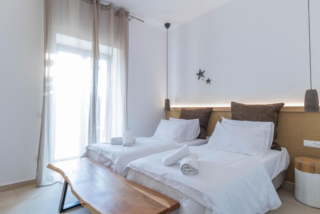 Postel nebo postele na pokoji v ubytování ALIRENE MYKONOS