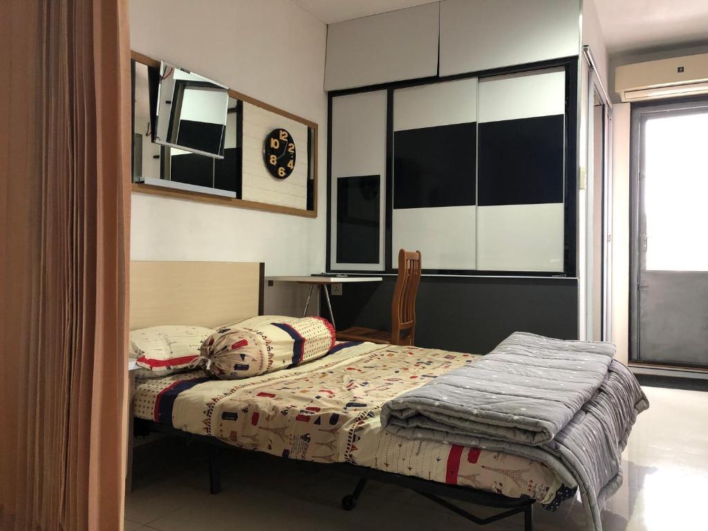 En eller flere senger på et rom på Mitra@MitraguesthouseB28-6