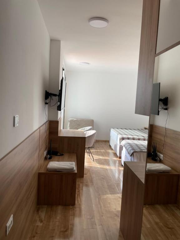 Postel nebo postele na pokoji v ubytování Hotel R