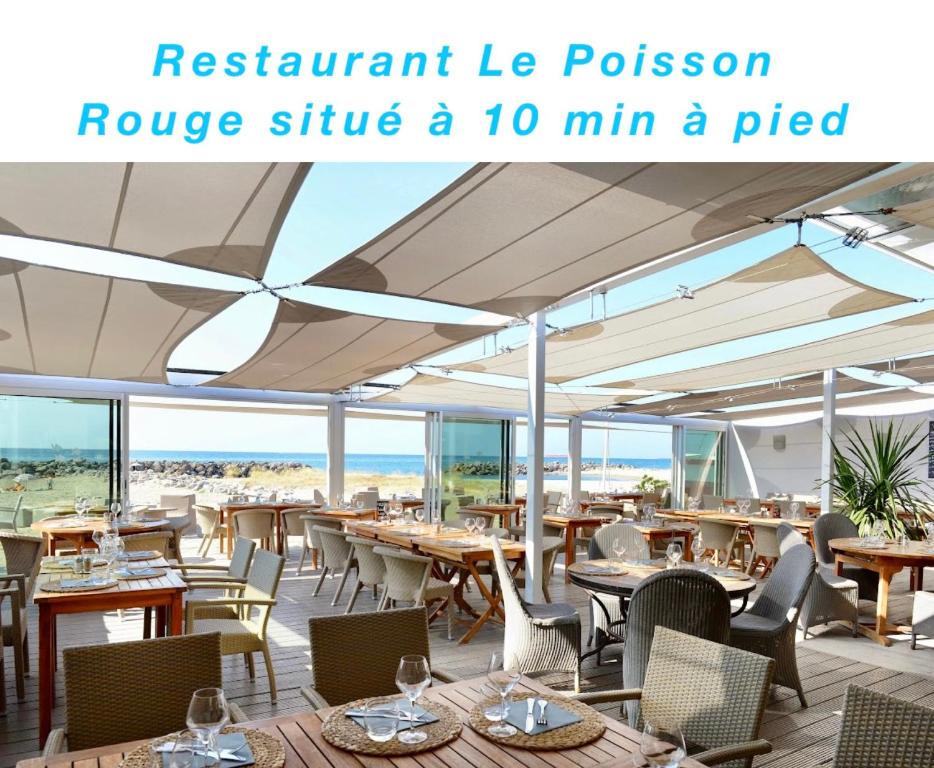 Ristorante o altro punto ristoro di Le Nautica Plage T2 climatisé en bord de mer