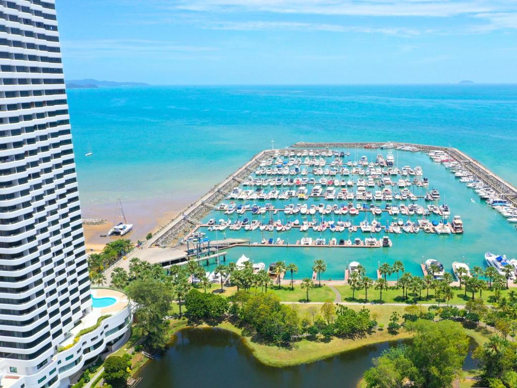 an aerial view of a marina with a hotel at Ocean Marina Resort Pattaya Jomtien in Na Jomtien