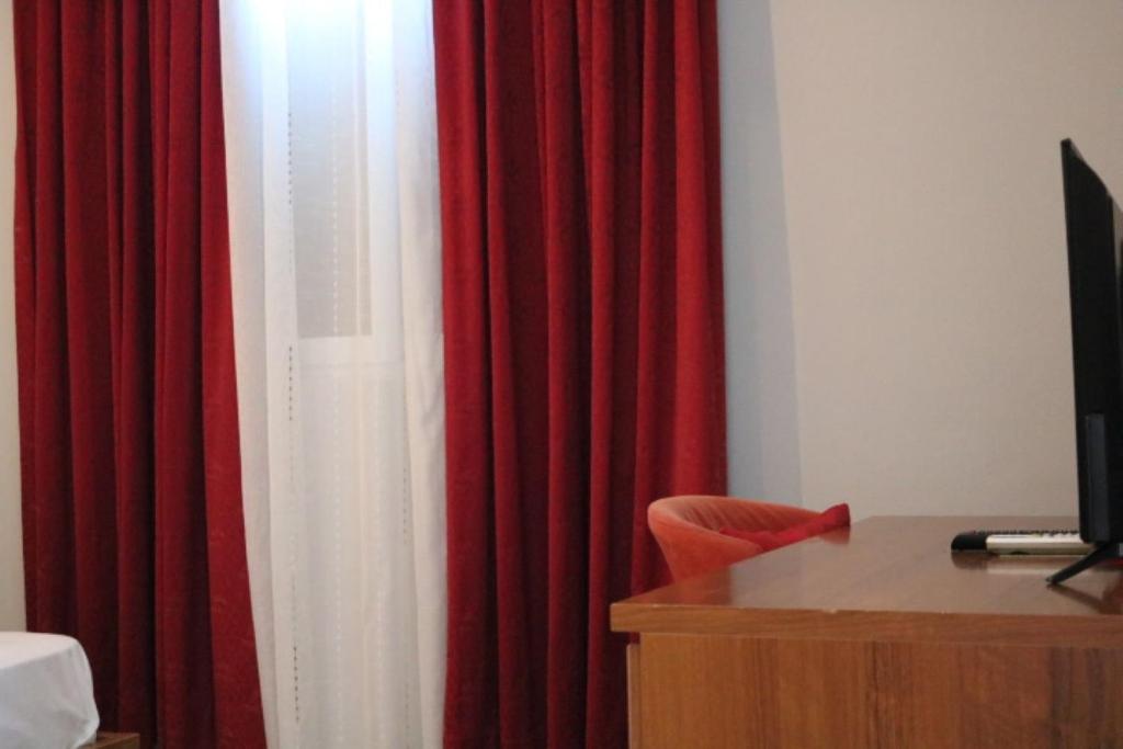 TV a/nebo společenská místnost v ubytování Hotel Ceka