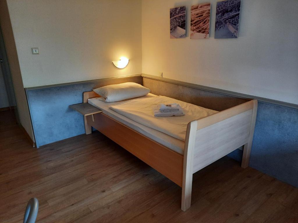 Postel nebo postele na pokoji v ubytování Gasthaus Post