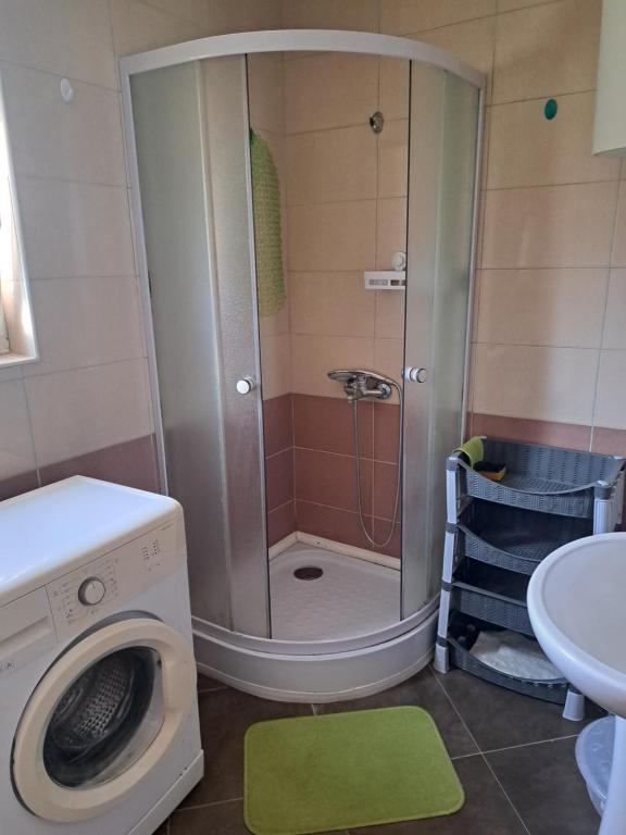 Koupelna v ubytování MD APARTMANI CANJ