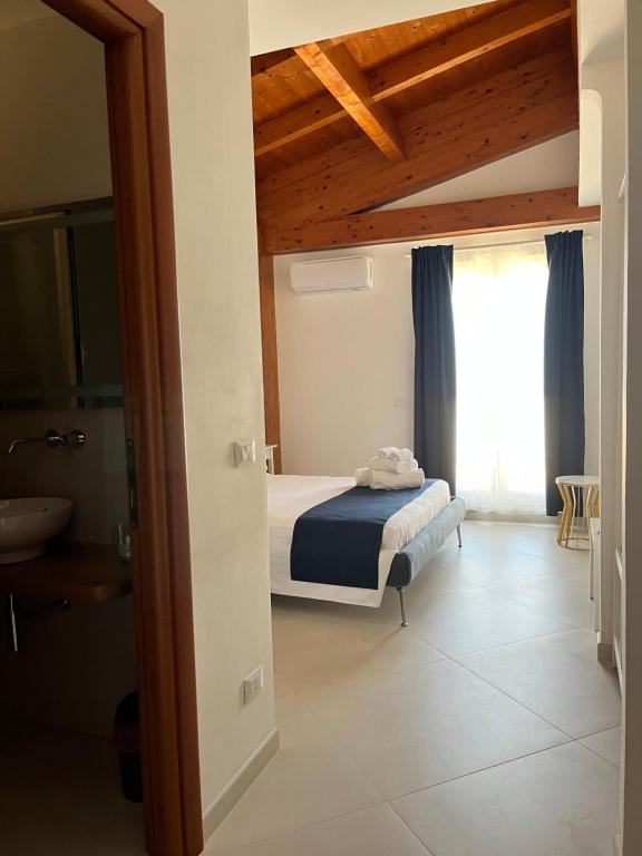 Postel nebo postele na pokoji v ubytování Labiente Suite & Breakfast