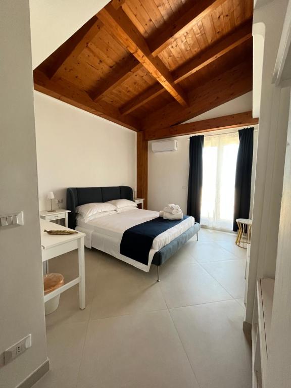 Postel nebo postele na pokoji v ubytování Labiente Suite & Breakfast