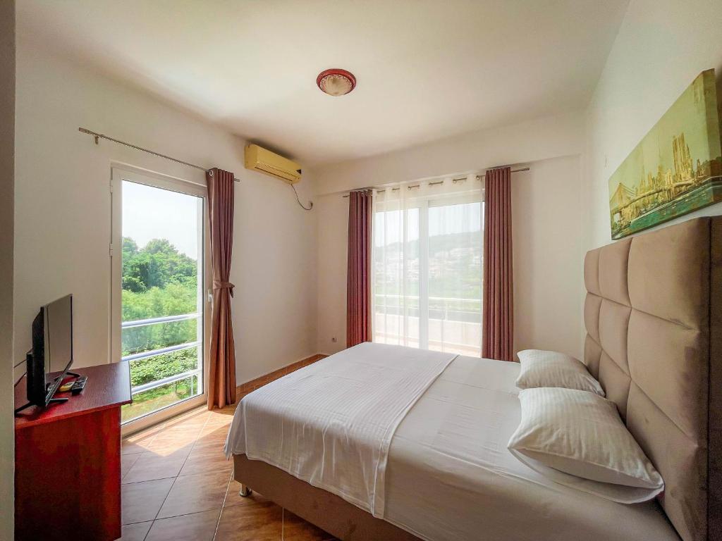 Postel nebo postele na pokoji v ubytování Villa Antonio