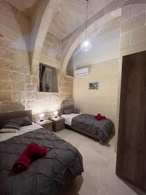 Letto o letti in una camera di Ta' Cikku Farmhouse
