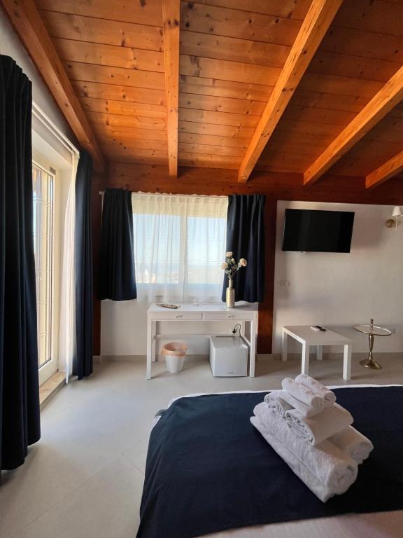 Postel nebo postele na pokoji v ubytování Labiente Suite & Breakfast