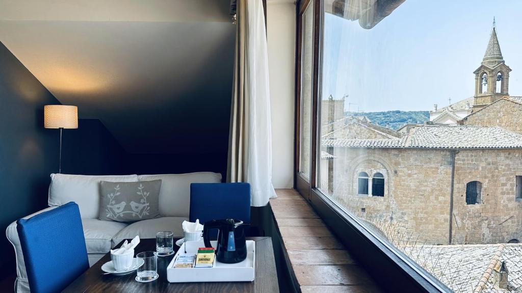 Posezení v ubytování Hotel Palazzo Piccolomini
