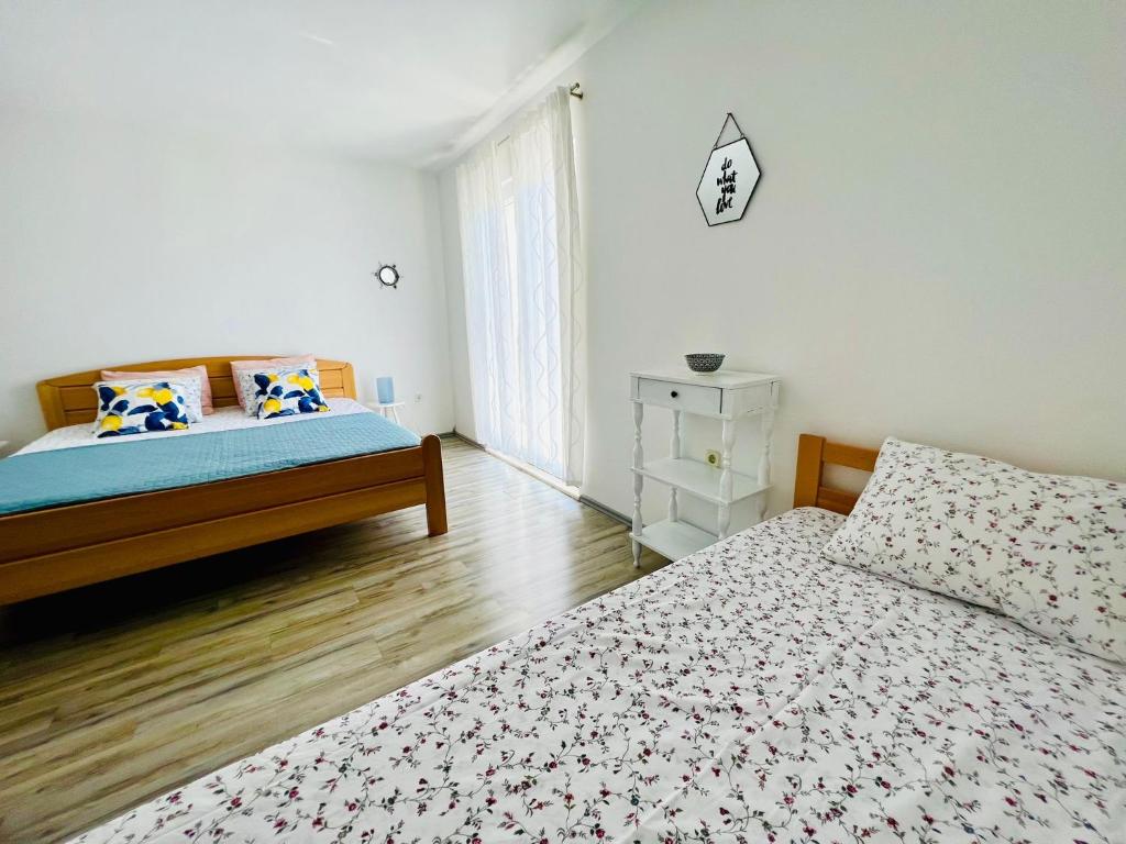 Postel nebo postele na pokoji v ubytování Lovely Summer Primošten