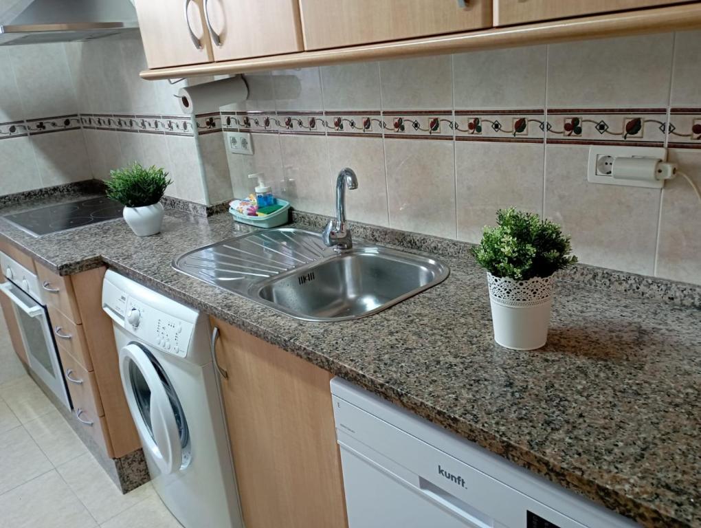 Kuchyňa alebo kuchynka v ubytovaní casa EDEN