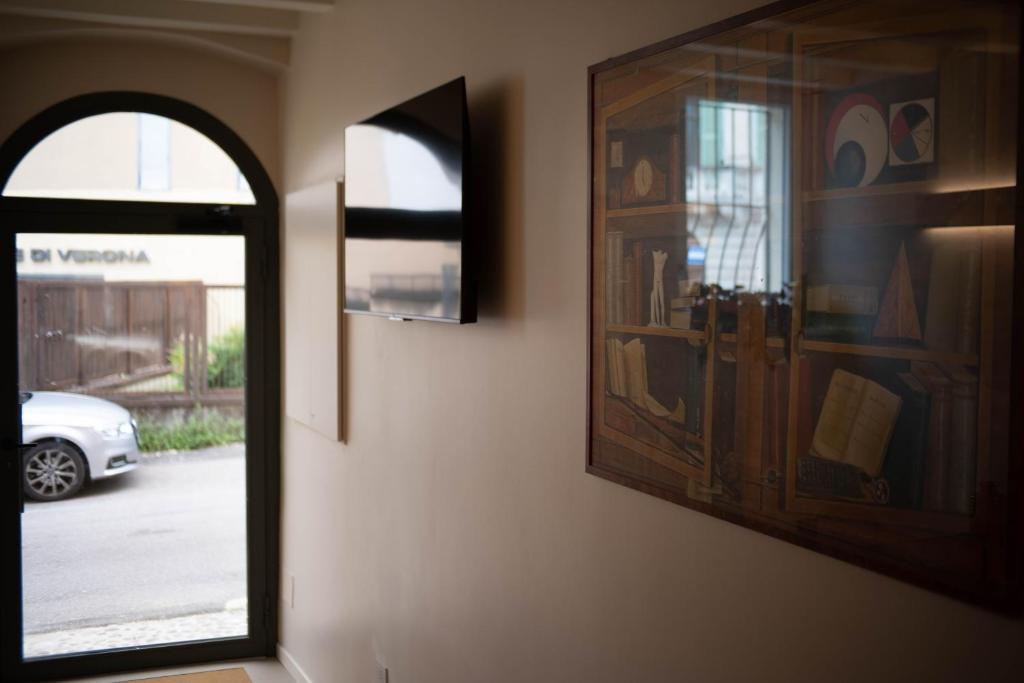 TV a/nebo společenská místnost v ubytování Maison Calcirelli rooms