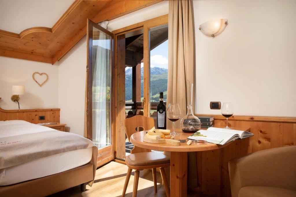 Postel nebo postele na pokoji v ubytování Hotel Galli