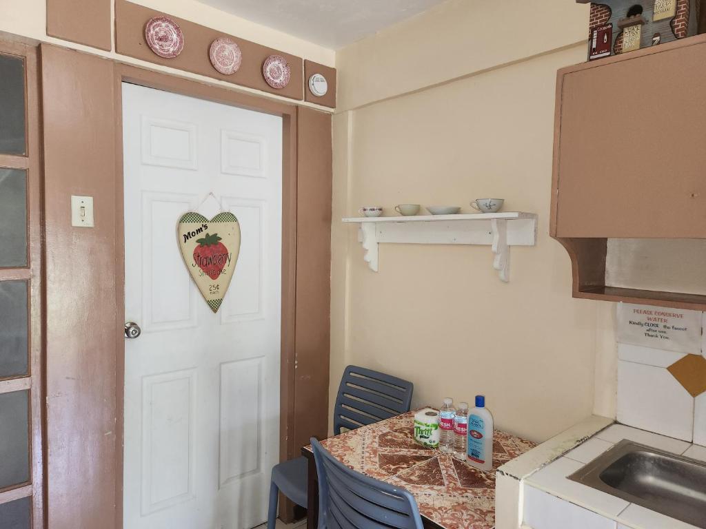 Kuchyň nebo kuchyňský kout v ubytování Country Sampler Inn