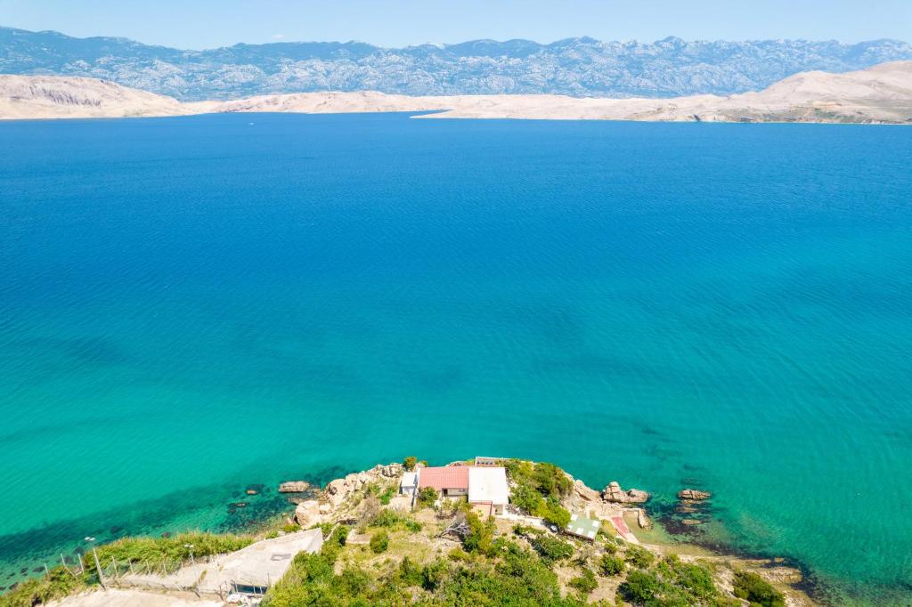 an island in the middle of a large body of water at Villa Sortis in Pag