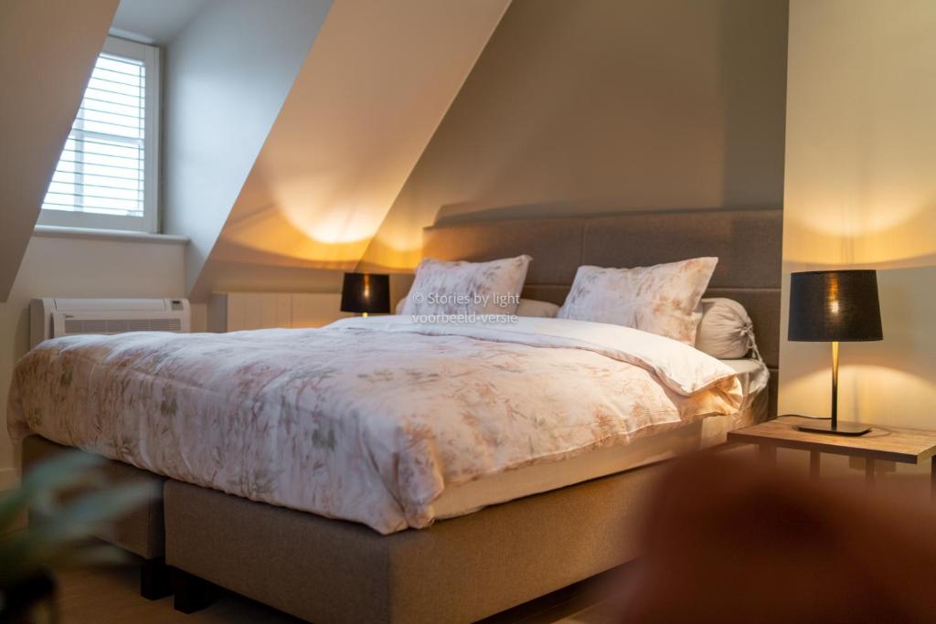 Postel nebo postele na pokoji v ubytování B&B Rosselaer