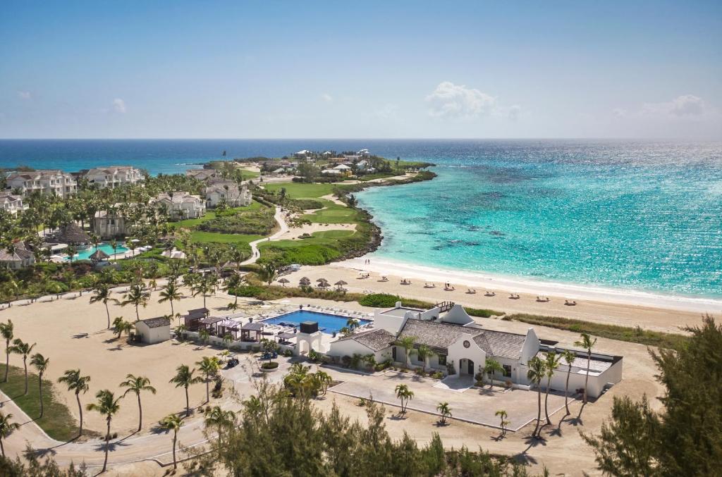an aerial view of a resort on the beach at Grand Isle Resort & Residences in Farmerʼs Hill