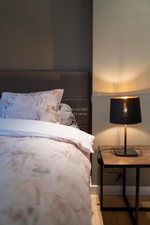 Postel nebo postele na pokoji v ubytování B&B Rosselaer