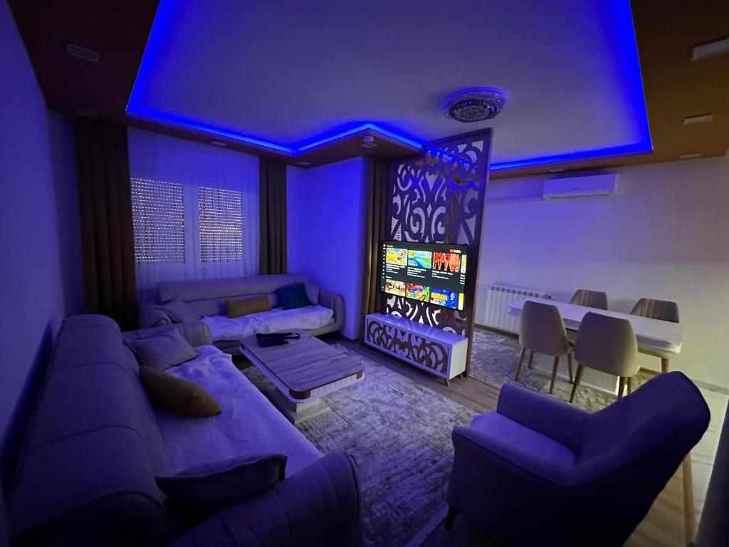 TV a/nebo společenská místnost v ubytování CityLux - Tutin
