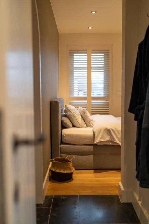 Postel nebo postele na pokoji v ubytování B&B Rosselaer