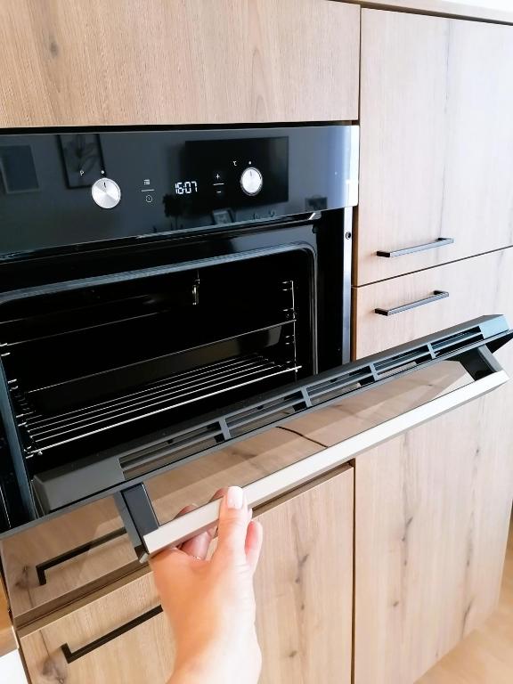 Kuchyň nebo kuchyňský kout v ubytování Shine Apartman