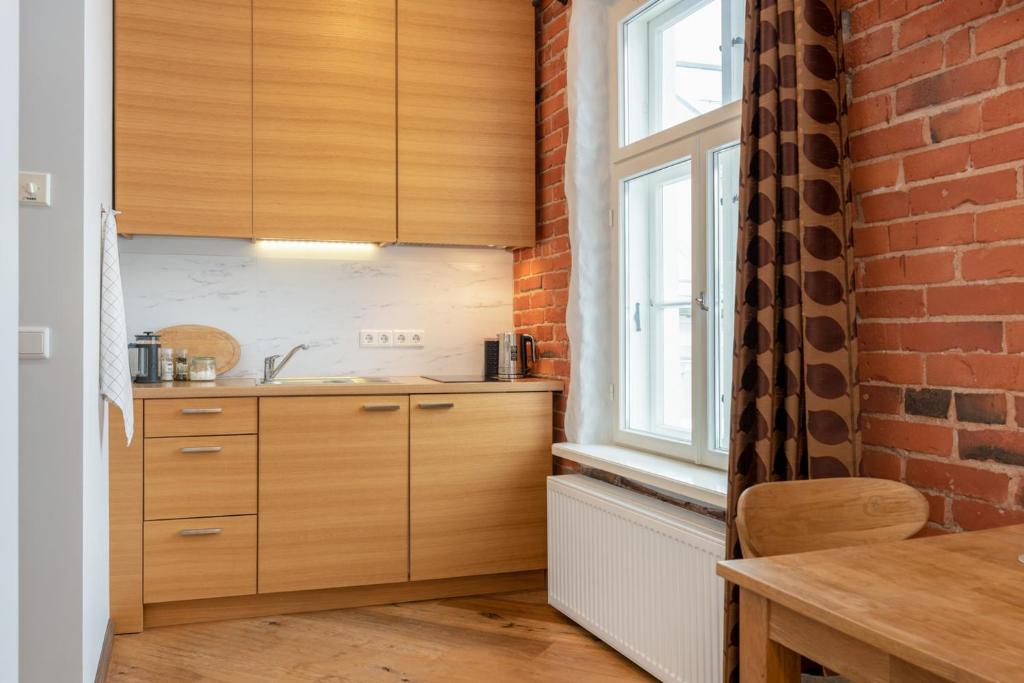 Kuchyň nebo kuchyňský kout v ubytování Rüütli Apartments in Tartu Old Town