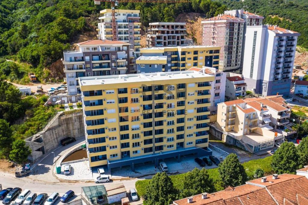 an overhead view of a city with tall buildings at Milorad in Budva