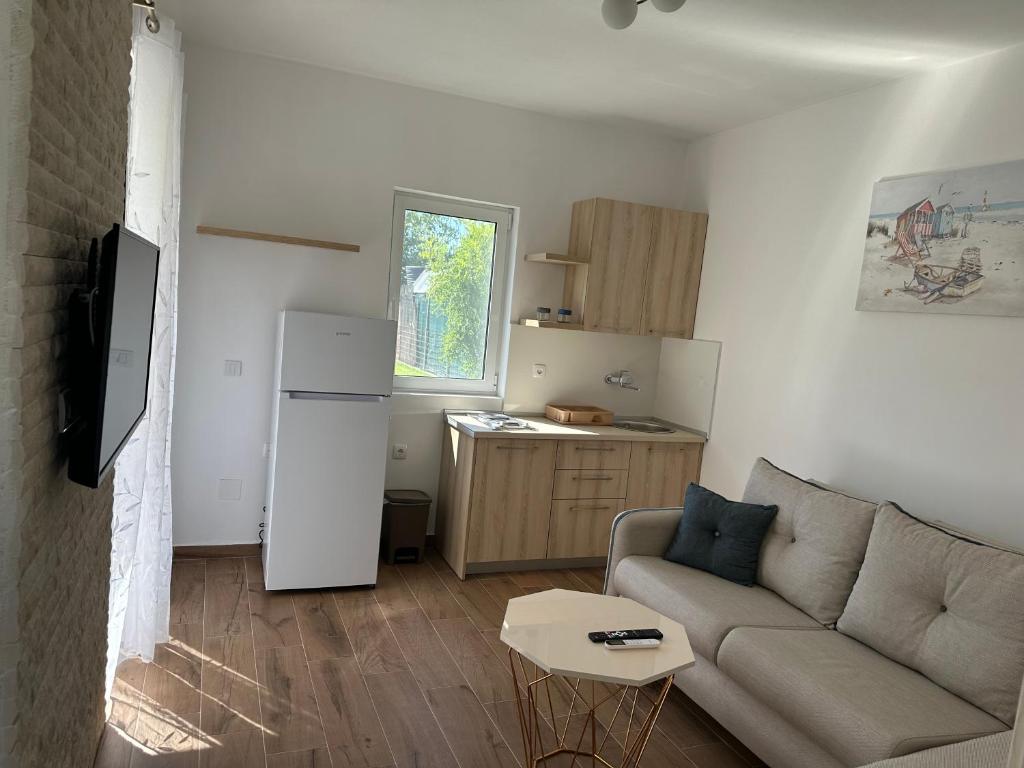 Kuchyň nebo kuchyňský kout v ubytování Niki Apartments