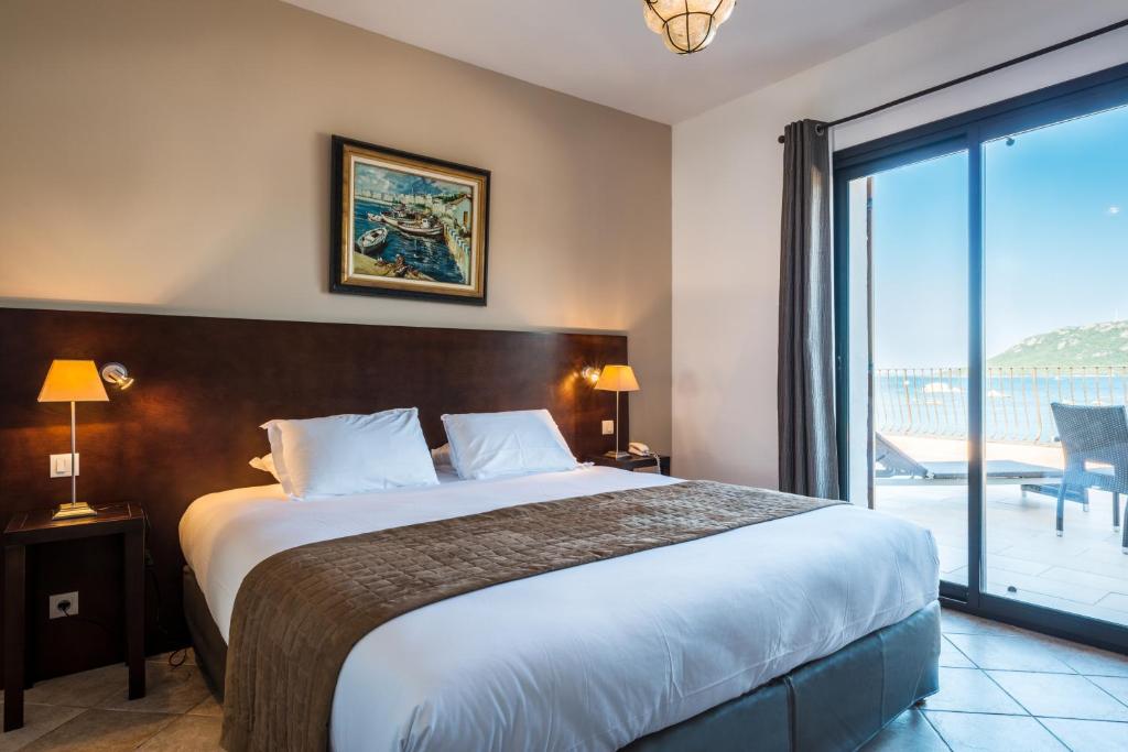 Postel nebo postele na pokoji v ubytování Hotel Shegara