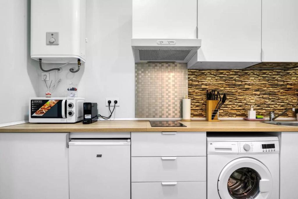 Kuchyň nebo kuchyňský kout v ubytování Umihouse apartamentos centro Alicante