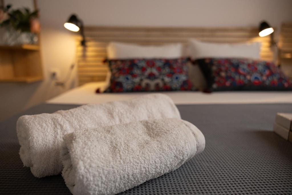 Postel nebo postele na pokoji v ubytování Villa Ruby Pessada