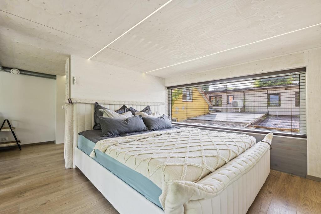 Postel nebo postele na pokoji v ubytování Cube house