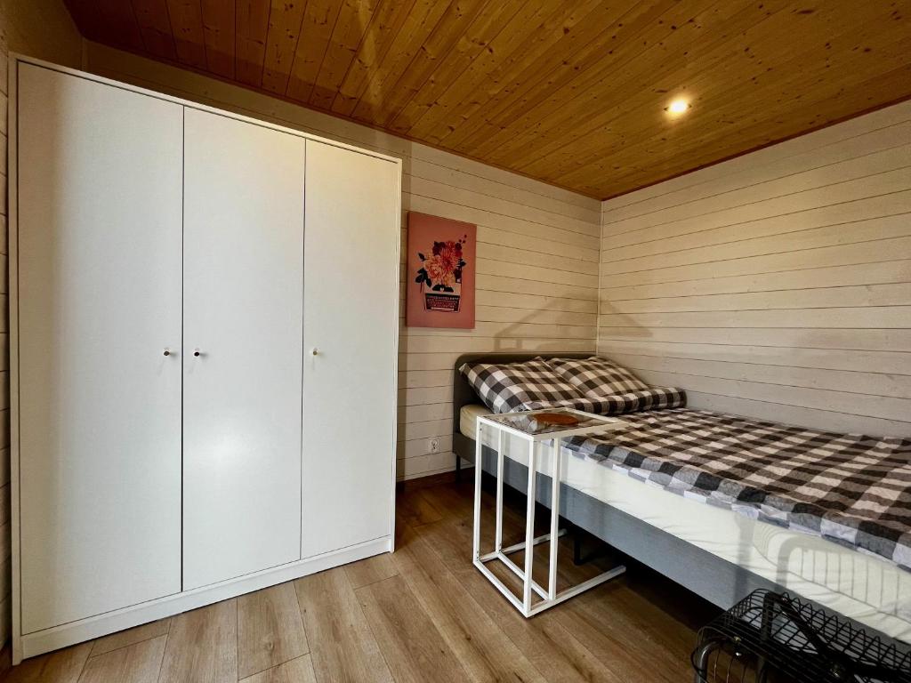 Postel nebo postele na pokoji v ubytování Domki Baltyk