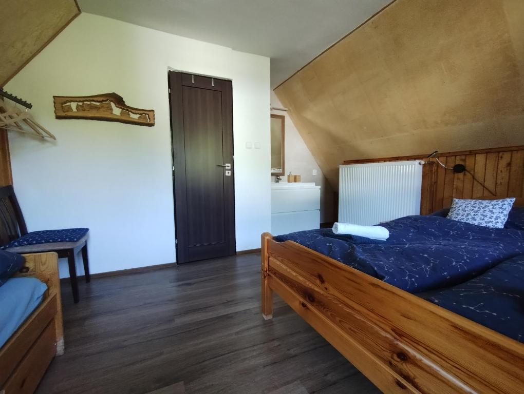 Postel nebo postele na pokoji v ubytování Chalupa U Šindelářů - Velké Karlovice