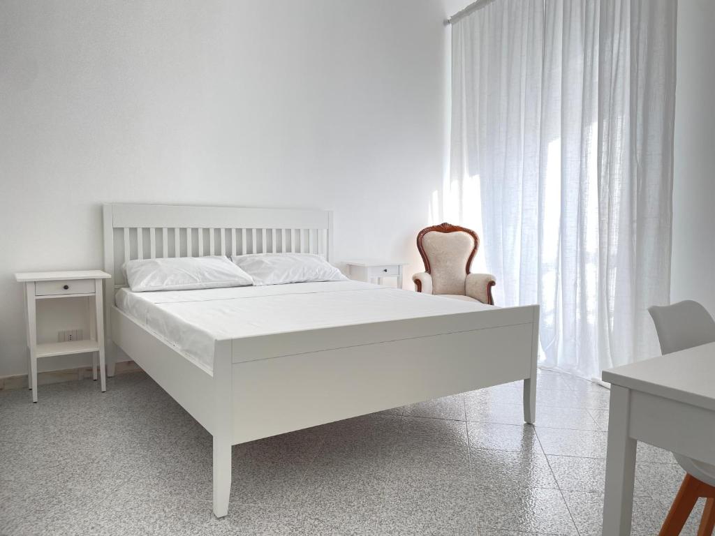 Postel nebo postele na pokoji v ubytování A Casa dei Miei