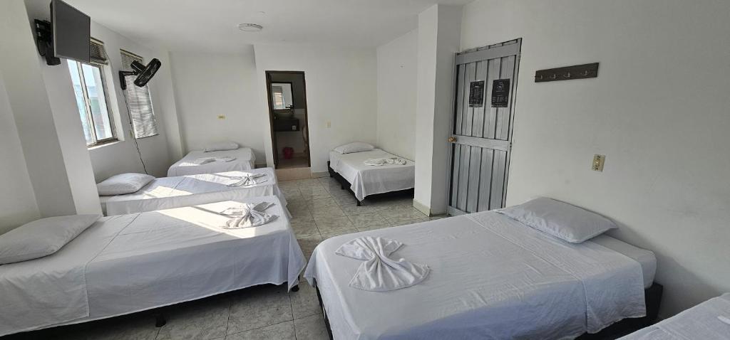 Postel nebo postele na pokoji v ubytování Hotel Bayadera Real