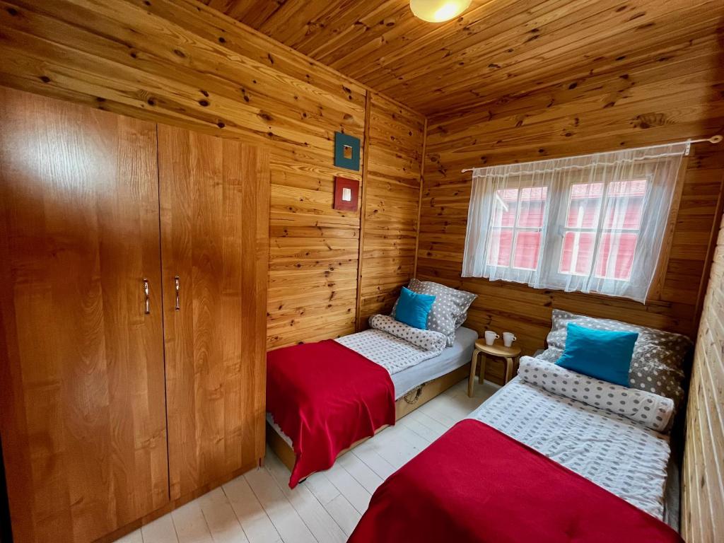 Postel nebo postele na pokoji v ubytování Domki Baltyk