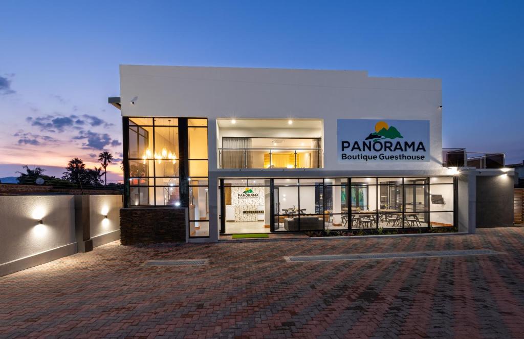 Panorama Boutique Guest House في غراسكوب: مبنى عليه لافته