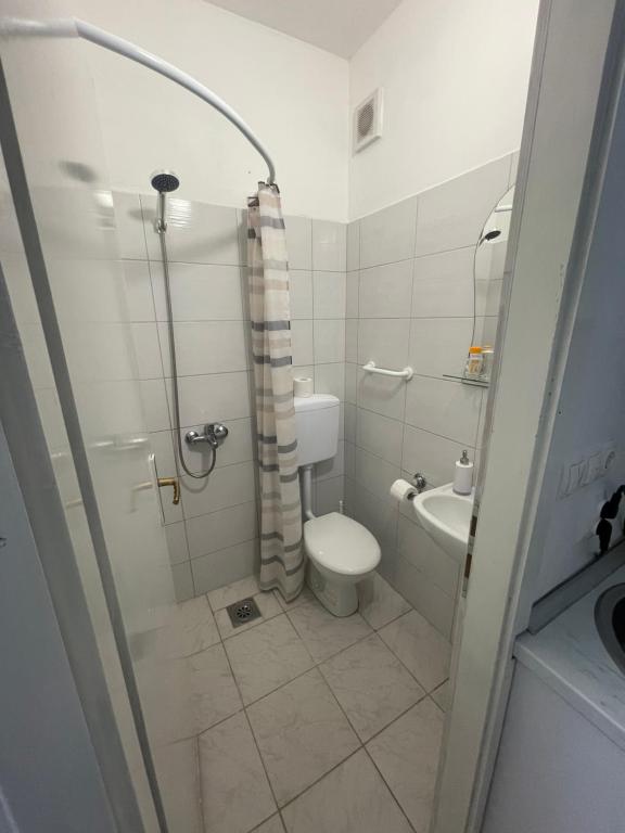 Ένα μπάνιο στο Apartments Glitter