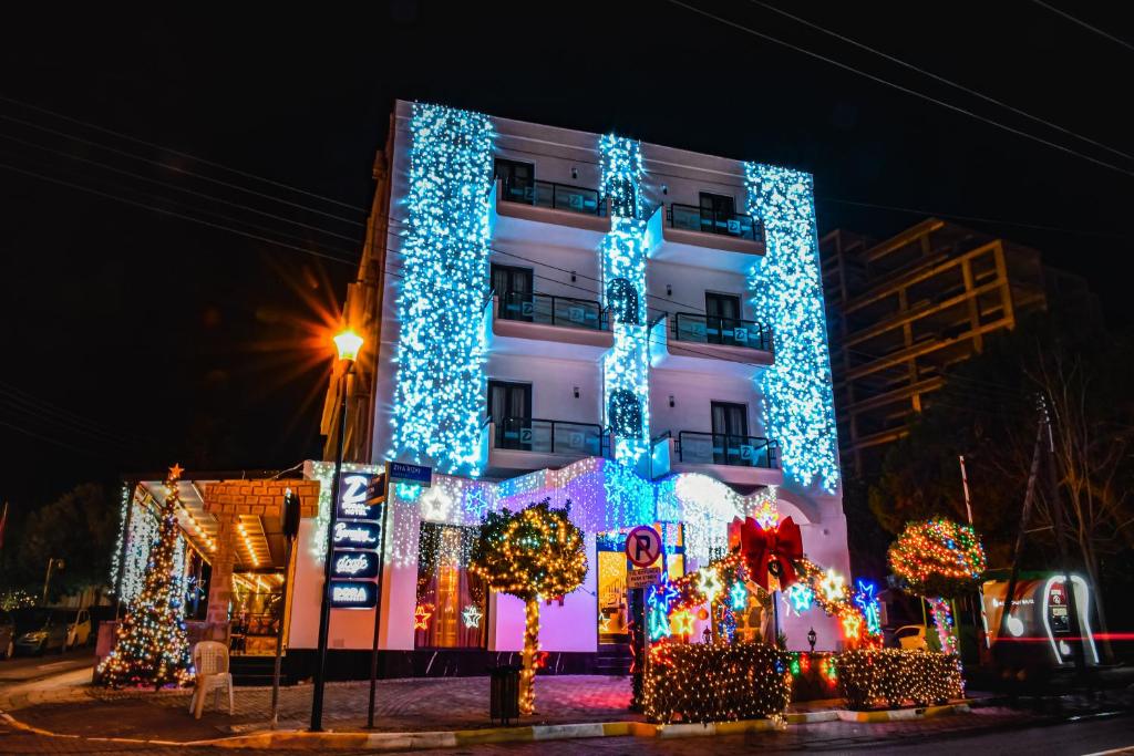 a building with christmas lights on it at Dorana Hotel in Kyrenia