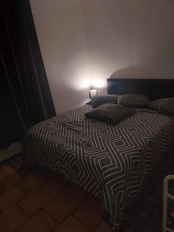 Postel nebo postele na pokoji v ubytování Appartement meublé avec deux chambres
