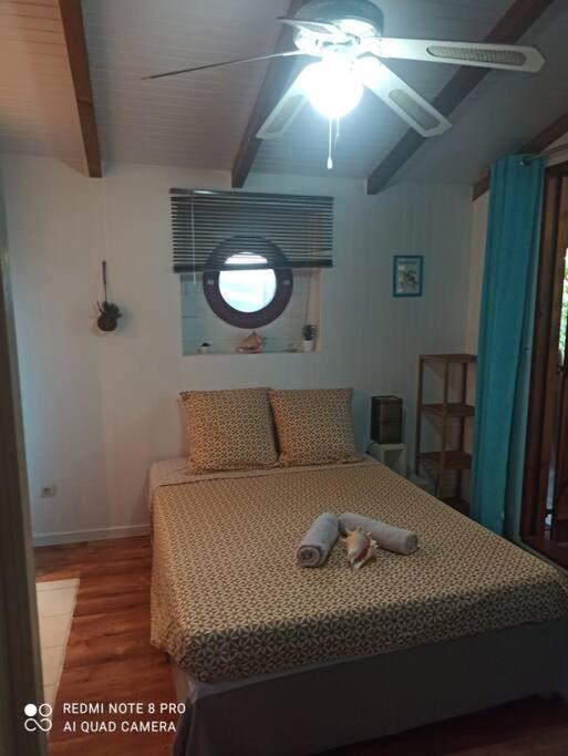 Postel nebo postele na pokoji v ubytování Ti-Case Appartement Jacuzzi à 100m de la plage