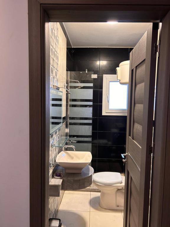 A bathroom at Fancy sea view villa with private jacuzzi mountain view north coast Bait Karim - Twin Villa with roof & juccuzi