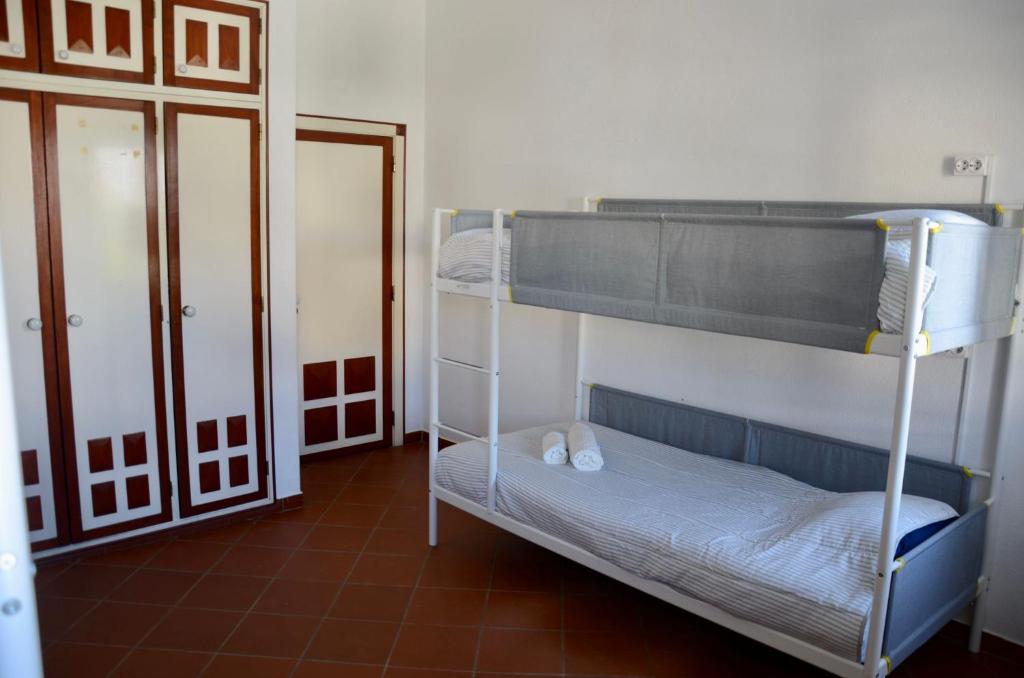 a bedroom with two bunk beds in a room at Villa 46 Hostel in Lagos