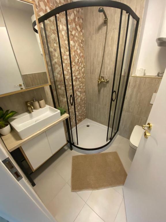 Koupelna v ubytování Hiša MegiClinic - APARTMENTS & HEALING CENTER