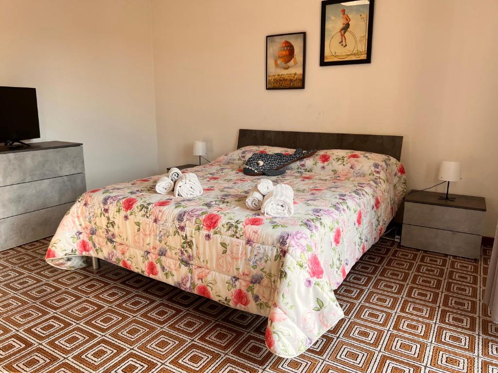 Un pat sau paturi într-o cameră la Gambero Blu